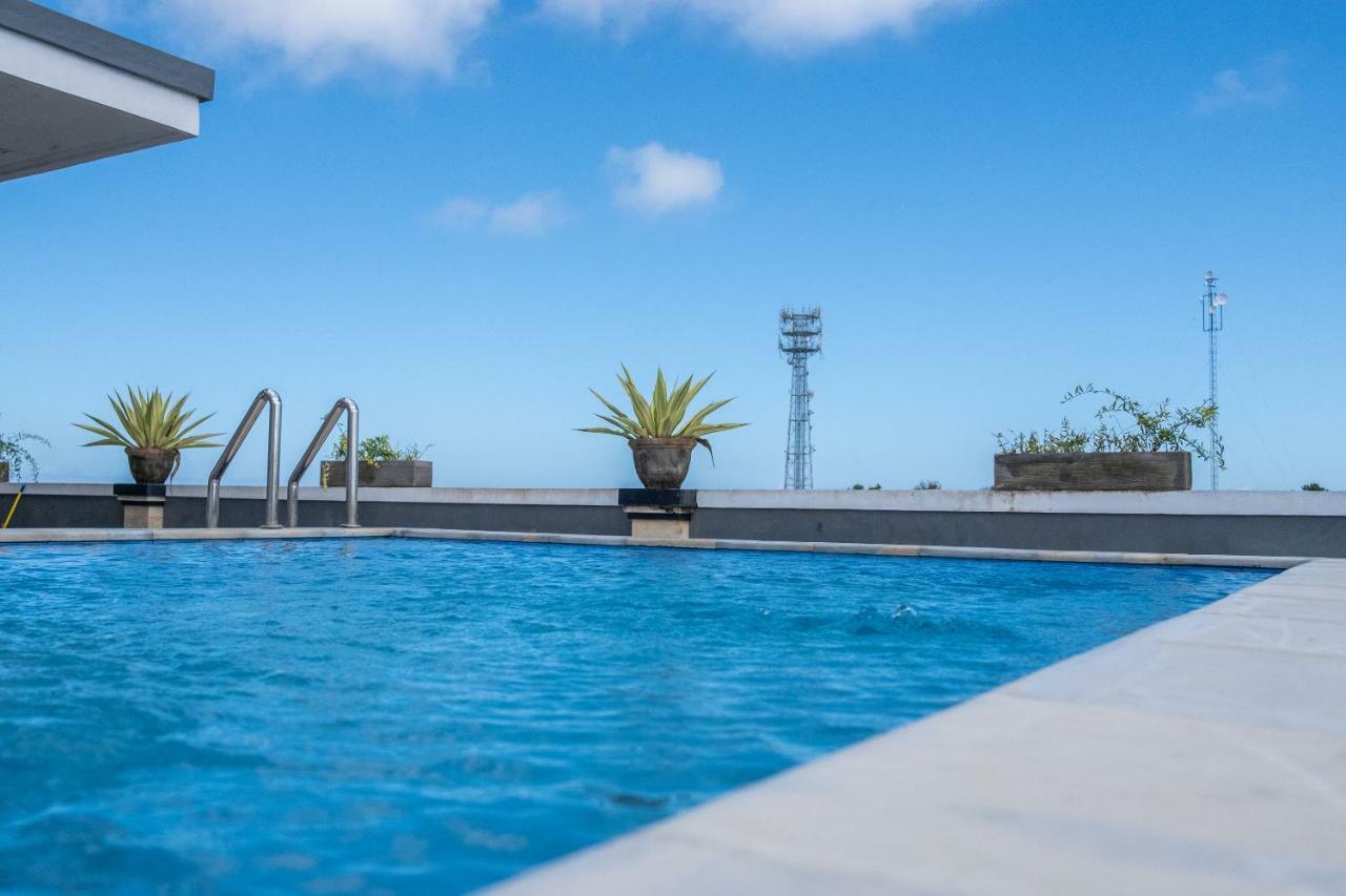 เรดดอร์ซพลัส ใกล้หาดดรีมแลนด์ Hotel จิมบาราน ภายนอก รูปภาพ